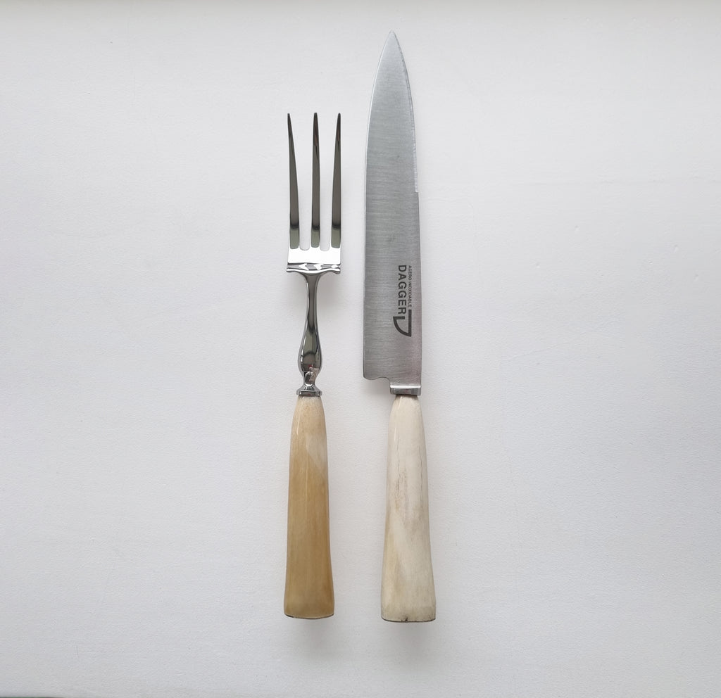 Argentine barbecue carving set with light-toned handles