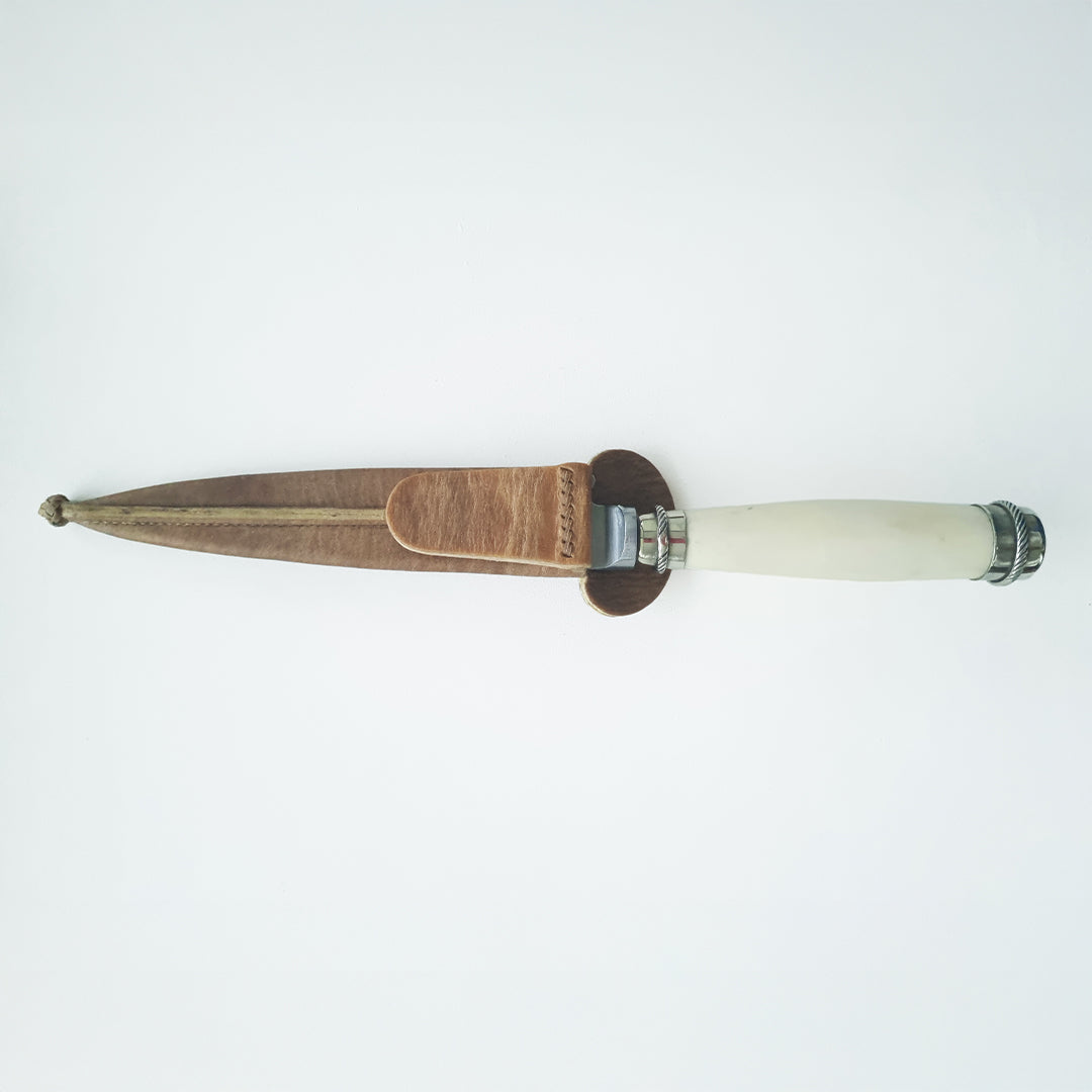 Handmade potro bone and alpaca knife with leather sheath