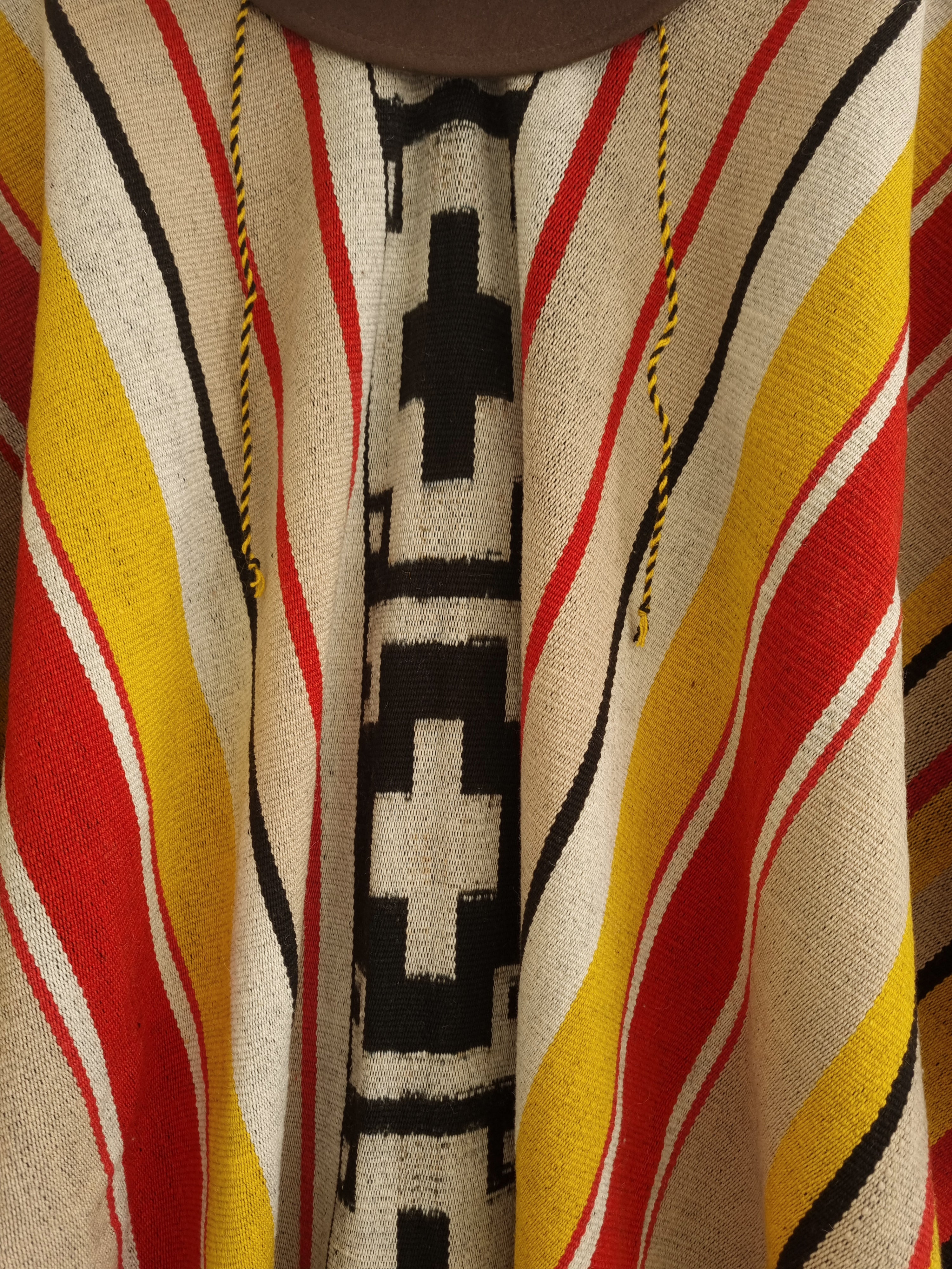 One-cloth Loro Huasi wool poncho with white cross Pampa motif